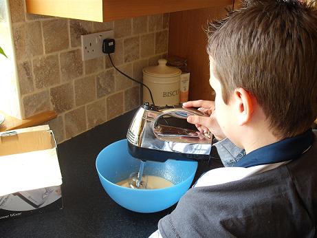 Enlist a small child to do the whisking