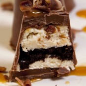 Baked vanilla cheesecake with homemade honeycomb and Oreo biscuit layer wrapped in chocolate from @cakeboule