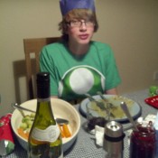 The Prof, showcasing the ruination of my Christmas table