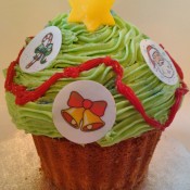 Jo from Jo's Kitchen's giant cupcake Christmas tree. http://joskitchen.wordpress.com/2011/12/17/english-mums-big-christmas-bakeoff/