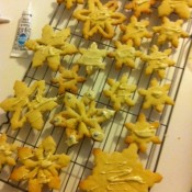 Snowflake biscuits rolled cut and decorated by Cari's 3 year old http://carirosen.com/ (KIDS ENTRY)