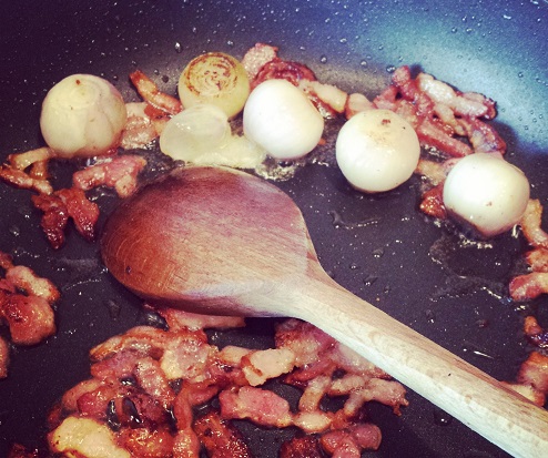 Frying off the pancetta and shallots