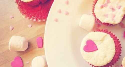 Red velvet cupcakes and melted marshmallow topping