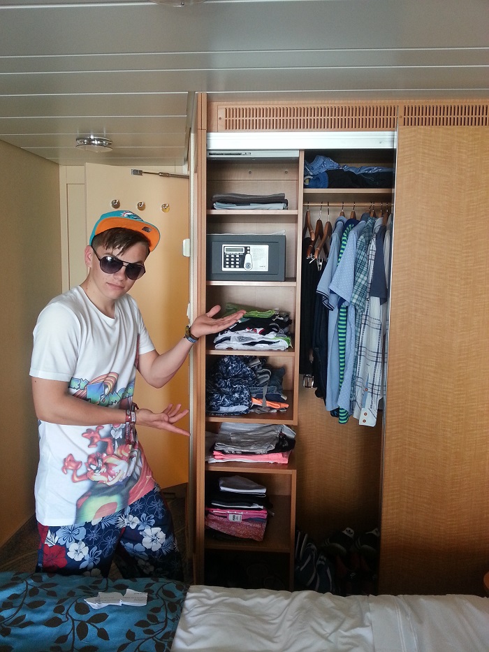 Our lovely assistant showing you our stateroom storage