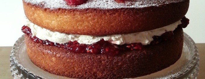 A classic Victoria sandwich with jam and cream