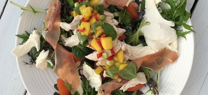 Mango, chicken mozzarella, and proscuitto salad