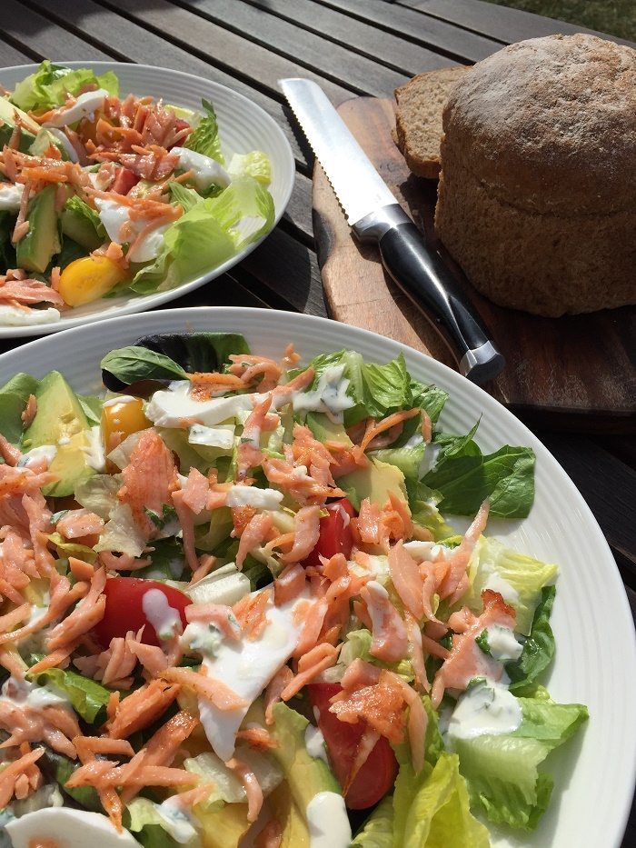 Smoked salmon and avocado salad with herby crème fraîche dressing