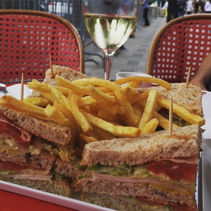 A snack and a spot of people watching on the Avenue de Champs