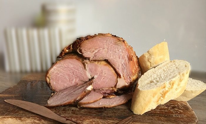 Spiced and glazed Christmas ham in Coca Cola