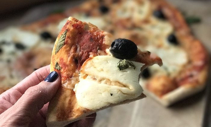 Halloumi, olive and mint pizzas