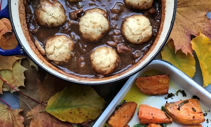 Slow cooked beef and red wine stew with dumplings and sage roasted sweet potatoes