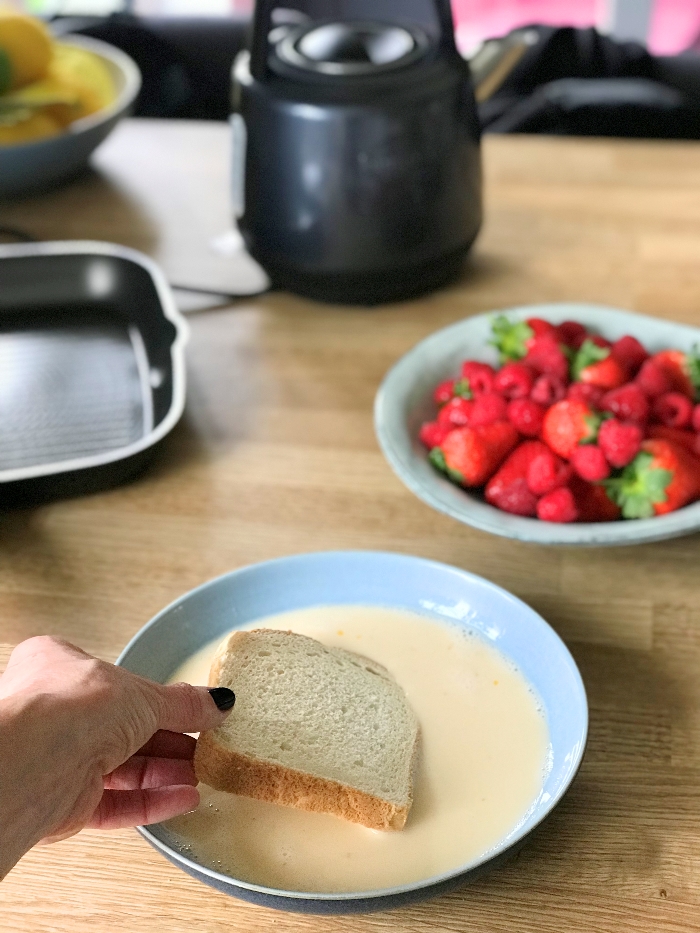 Place the bread slices into the egg mixture to soak