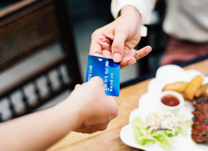 Remember to check the small print on dining offers - photo by rawpixel on Unsplash