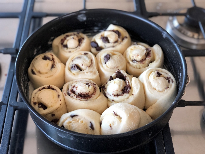 The buns will squish together as they rise