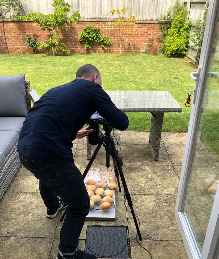 Photographer Andrew setting up to shoot the sticky lemon buns