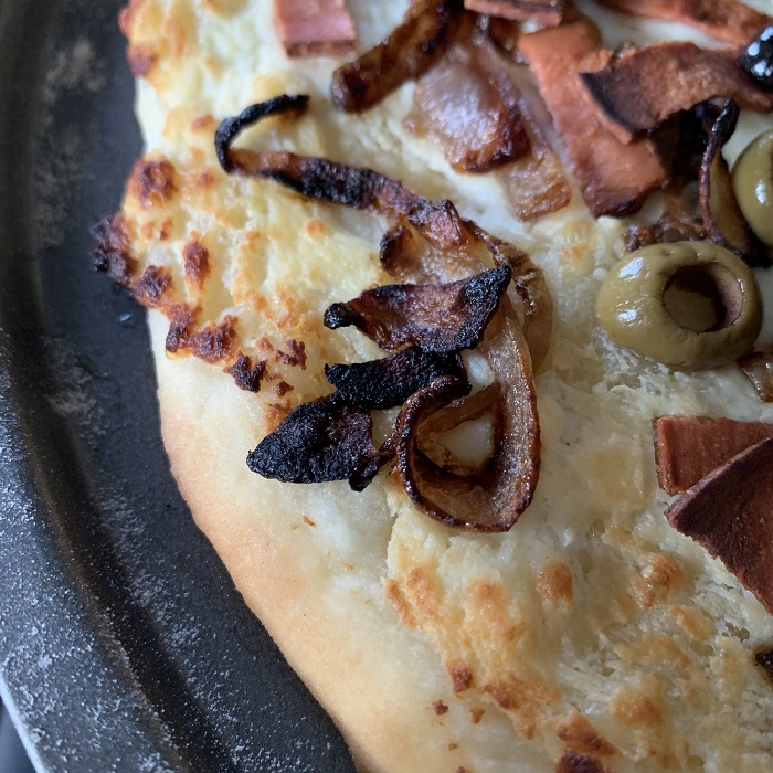 White and green pizza from Sal's Market Deli at Loews Portofino Bay Hotel, Universal Orlando Resort