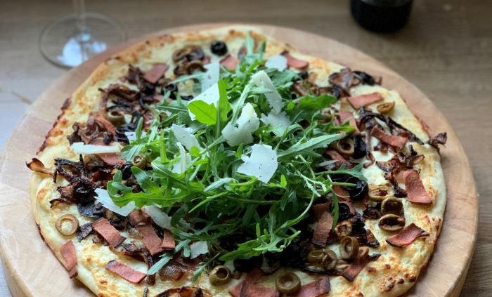 White and green pizza from Sal's Market Deli at Loews Portofino Bay Hotel, Universal Orlando Resort